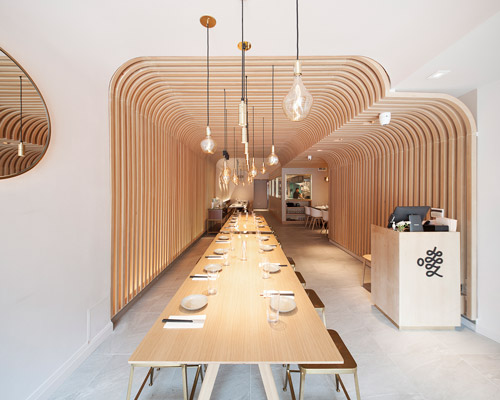 new practice studio's slurp restaurant in NY features noodle-like arch