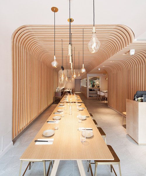 new practice studio's slurp restaurant in NY features noodle-like arch