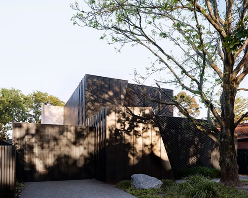 pandolfini architects adapts sculptural townhouse in australia to fit large family