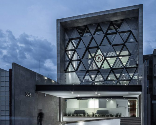 PLASTIK's mexican agency honors the company logo with its triangular pattern facade