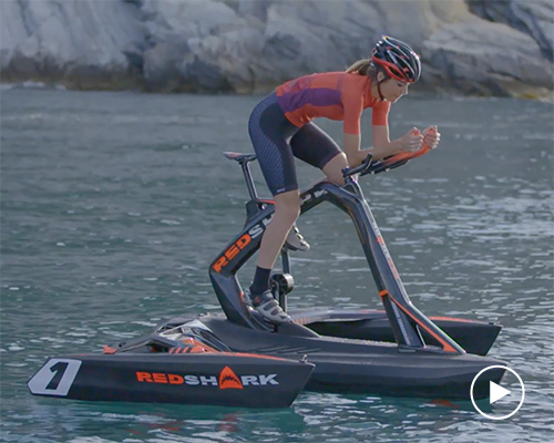 ex-BMW designer creates pedal-powered trimaran for cyclists to bike on water