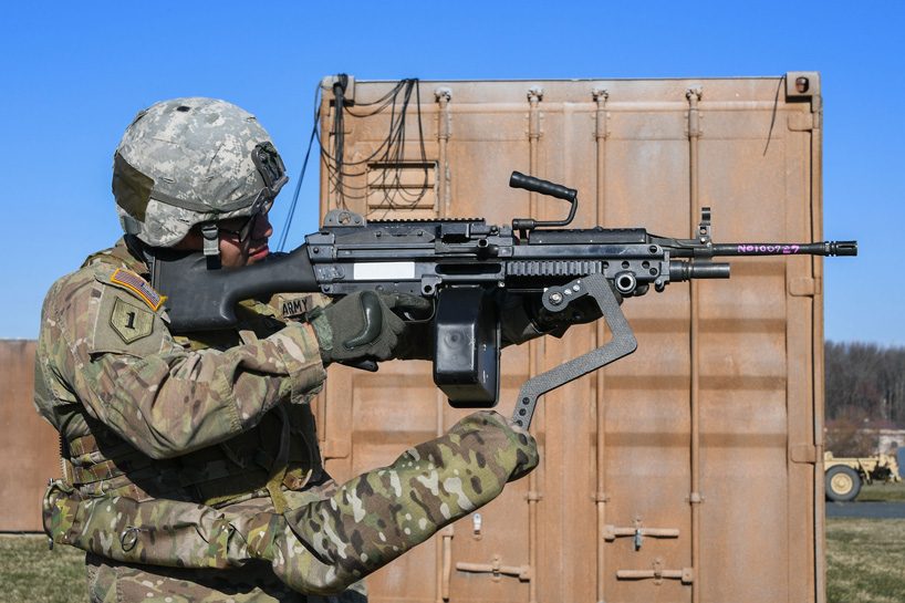 US army researchers are testing a 'third arm' exoskeleton for soldiers
