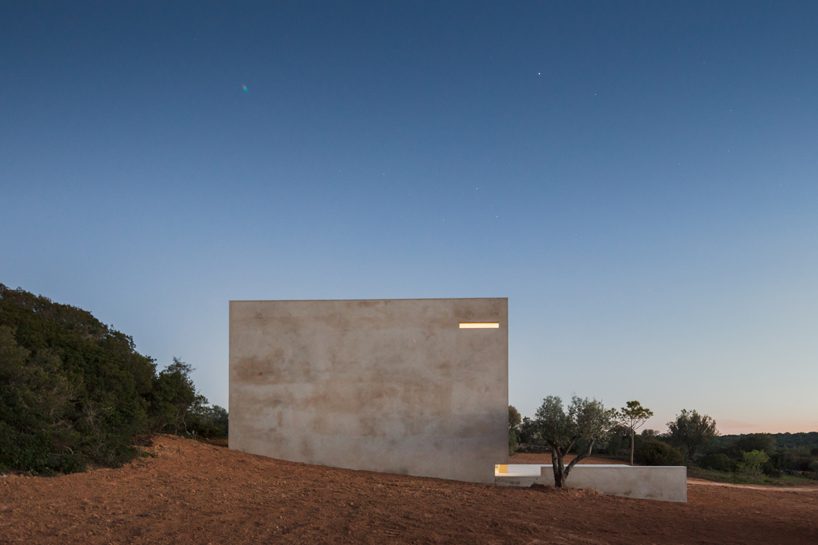 álvaro siza vieira builds hillside chapel in portugal without electricity, heat or running water