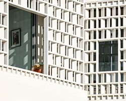 lopez-rivera's casa celosía along spain's coastline is clad with delicate ceramic latticework