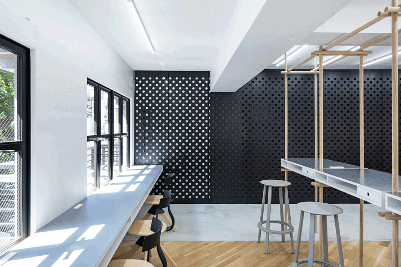 daisuke motogi architects designs 'dappled' office in tokyo