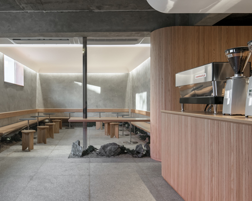 underground coffee shop fuses contemporary minimalism with traditional korean aesthetics