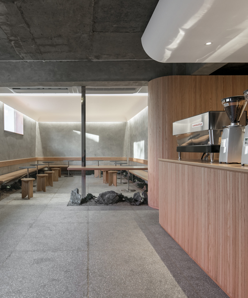 underground coffee shop fuses contemporary minimalism with traditional korean aesthetics