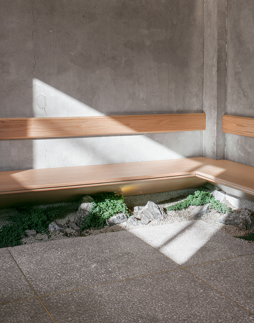 underground coffee shop fuses contemporary minimalism with traditional korean aesthetics