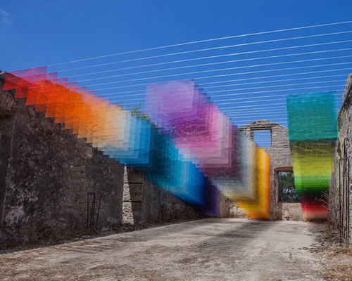 quintessenz uses spray paint and mesh to create 'digital pixels' in ancient greek ruins