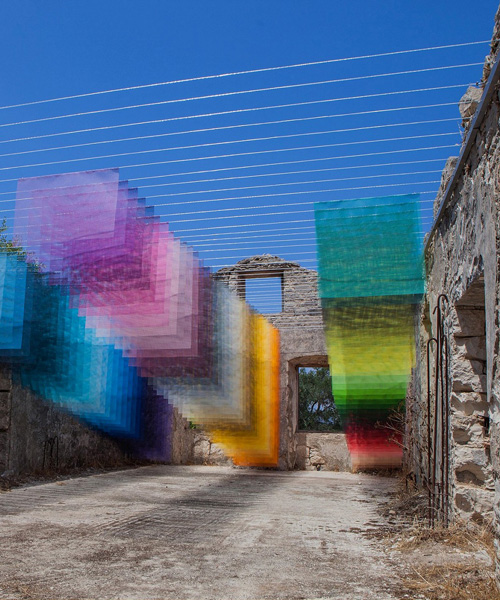 quintessenz uses spray paint and mesh to create 'digital pixels' in ancient greek ruins