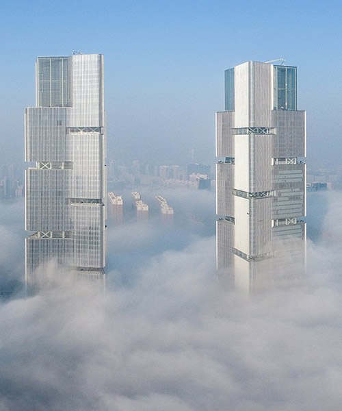 the twin greenland towers by gmp architekten define the skyline of zhengzhou