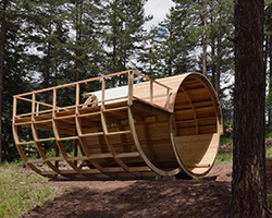 jiří příhoda creates 'diogene's barrel' writers pavilion among the dolomites of northern italy