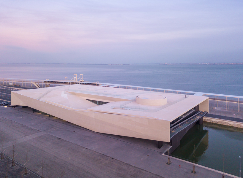 JLCG architects' cruise terminal mediates the visibility between the ...