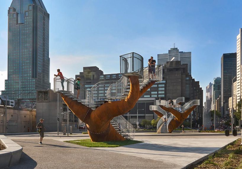 michel de broin's public sculptures emerge from the ground like giant tree trunks