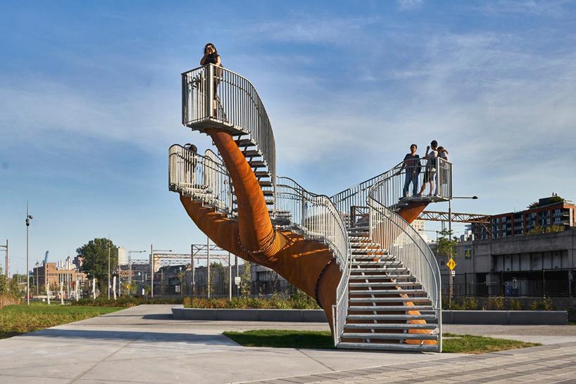 michel de broin's public sculptures emerge from the ground like giant tree trunks