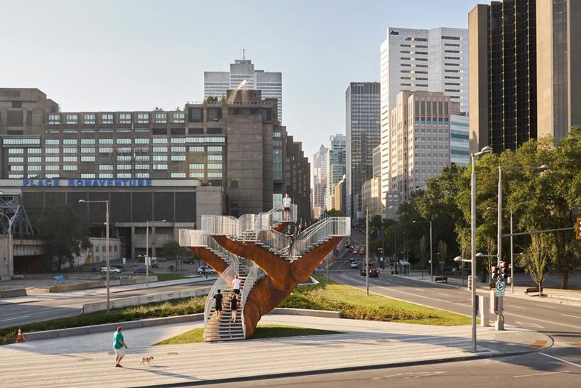 michel de broin's public sculptures emerge from the ground like giant tree trunks