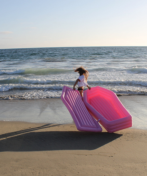 bury yourself this summer in this pink coffin pool float