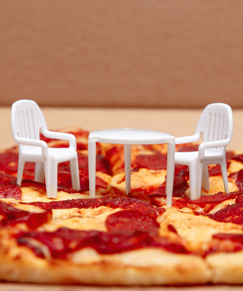 finally, that little plastic pizza table has its own tiny takeout patio chairs