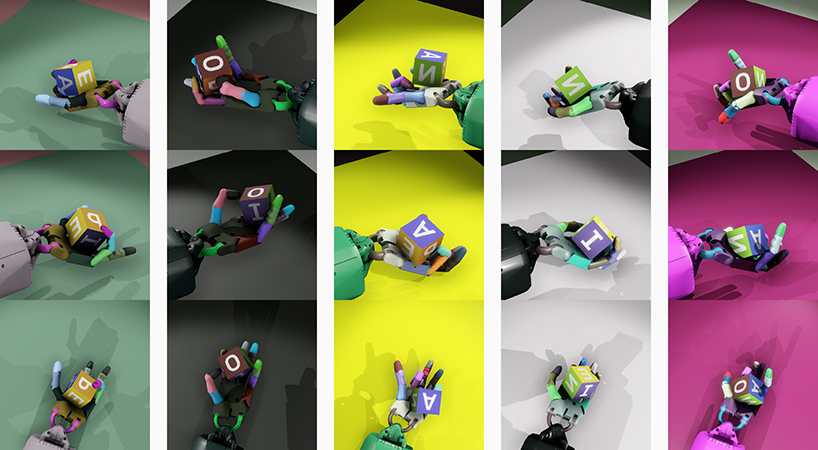 robot hand rotates cube