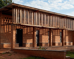 studio FH adds dormitories and classrooms to a college campus in uganda