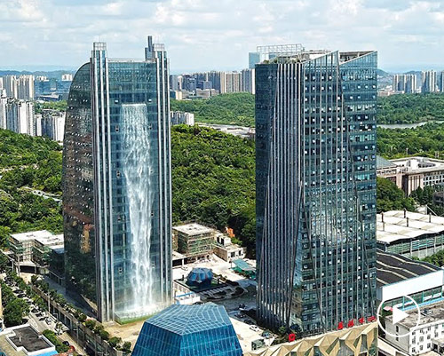 watch: 100 meter waterfall cascades off a skyscraper in china