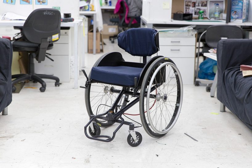 the backrest of this wheelchair doubles up as the steering wheel reto togni