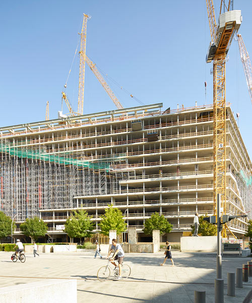 construction of OMA-designed axel springer campus captured by nils koenning