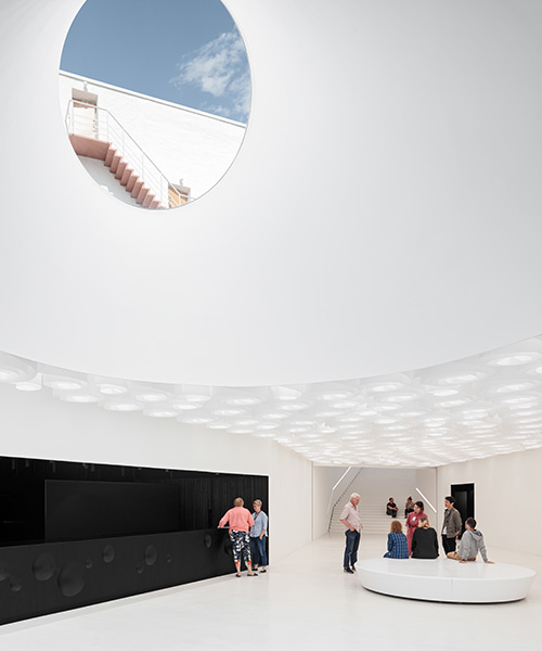 underground art museum 'amos rex' transforms helsinki square into landscape of skylights
