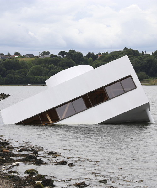 le corbusier's villa savoye floating in a danish fjord is a comment on the ‘sinking’ of modernity