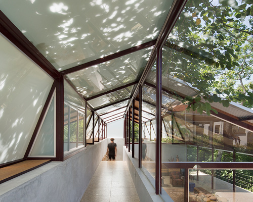 carla juaçaba embeds linear home into rio de janeiro's hilly terrain