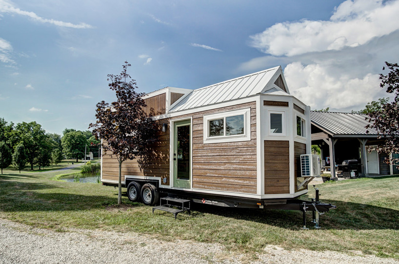 extremely functional, tiny home-on-wheels packs a large social area in ...