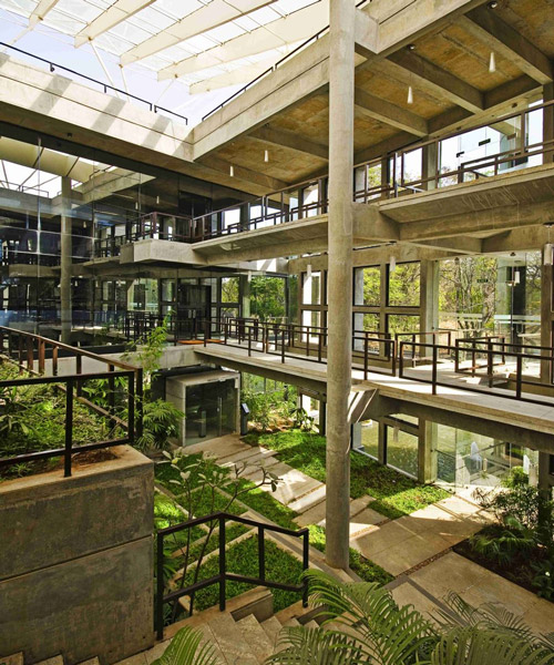 CORE architecture plants a tropical garden on a concrete hillock in this energy-efficient office building, india