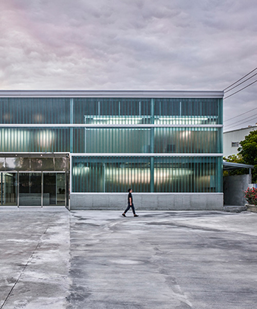 waterfrom uses transparent plastic sheets and mesh to renovate 30-year old factory