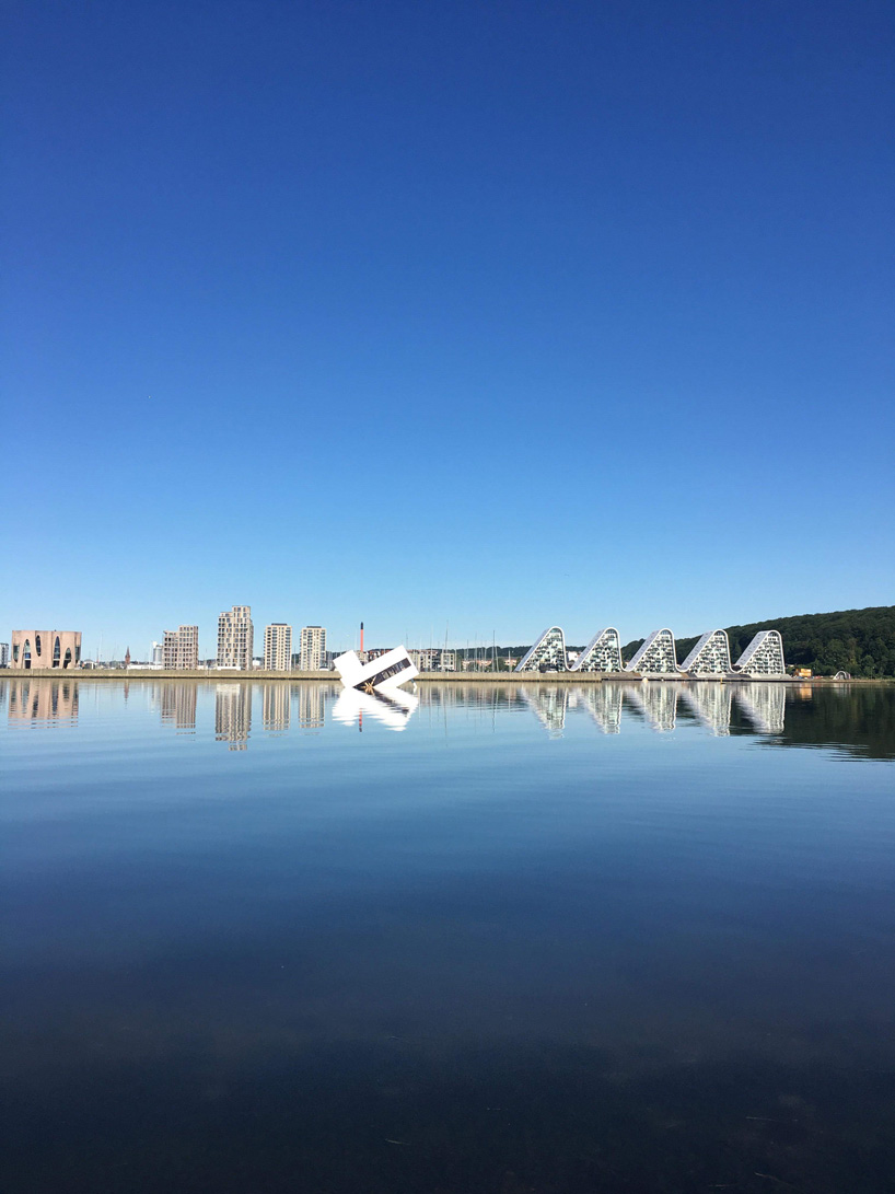 le corbusier's villa savoye floating in a danish fjord is a comment on the ‘sinking’ of modernity