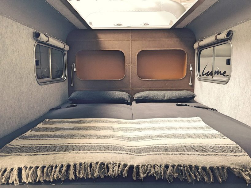 this aluminum camper comes with a panoramic open roof that lets you sleep under the stars