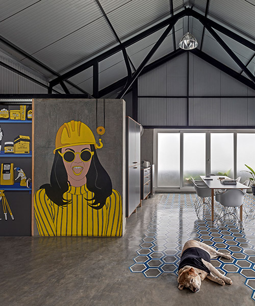 m9's studio in bangalore features colorful murals with the designers at work