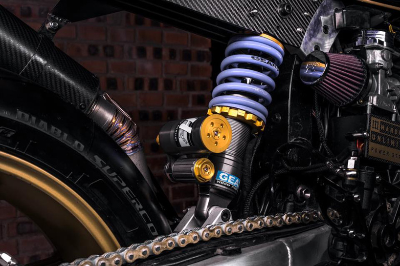 mandrill garage propels custom triumph T100 motorcycle into the future