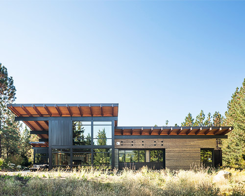 this net-zero cabin in american suburbs uses only reclaimed materials, by coates design architects