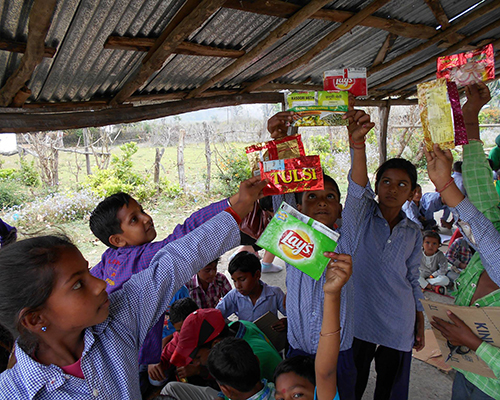 students in india fight plastic by sending back waste wrappers to manufacturers