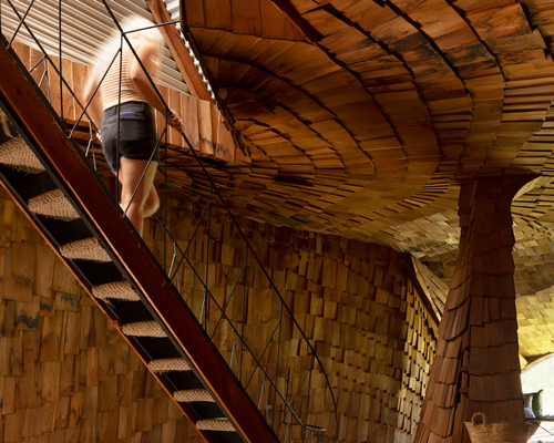 step inside the 1960s 'prairie house' in oklahoma collaged in swirling cedar shingles