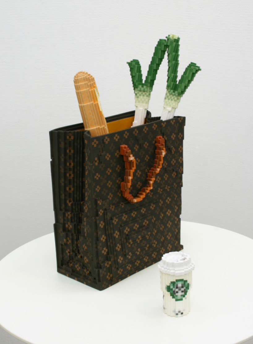 toshiya masuda's low pixel ceramics resemble the icons of 1980s computer games