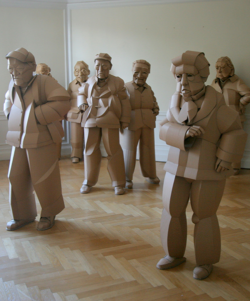 warren king uses cardboard to sculpt full-scale villagers of his ancestral chinese home