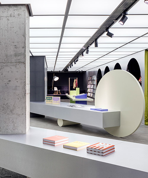 hangzhou dreamscape marries the art of books with normann copenhagen furniture, by alberto caiola