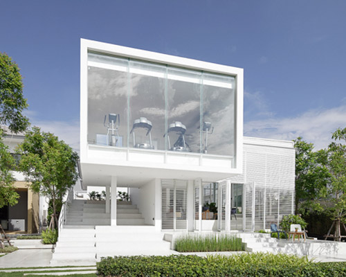 the sky clubhouse features a white gradient façade to filter the sunlight, by design in motion