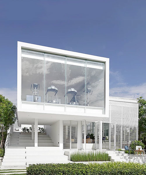 the sky clubhouse features a white gradient façade to filter the sunlight, by design in motion