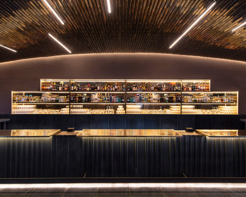 esrawe designs brass and copper bar at auditorio nacional in mexico city