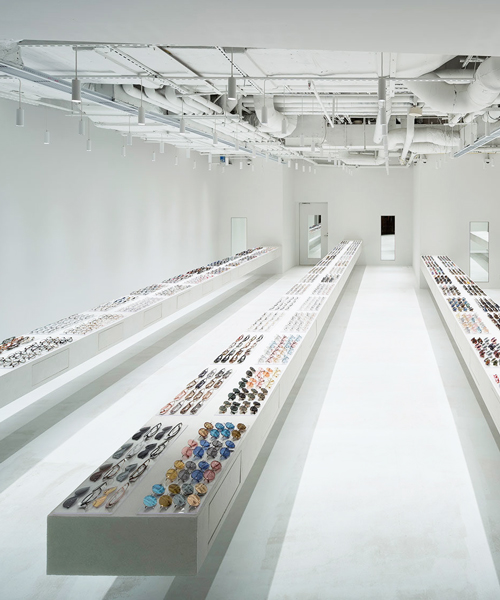 junya ishigami creates 12-meter cantilevered display shelves for JINS eyewear store