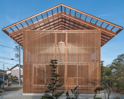 kota mizuishi's house in otai has a timber screen that encloses a sheltered outdoor space