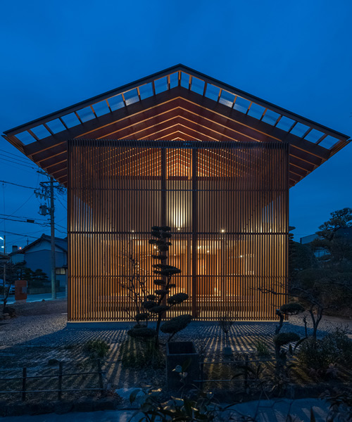 kota mizuishi's house in otai has a timber screen that encloses a sheltered outdoor space