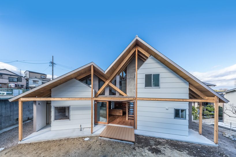 maki yoshimura frames two-volume house in japan with timber truss skeleton designboom